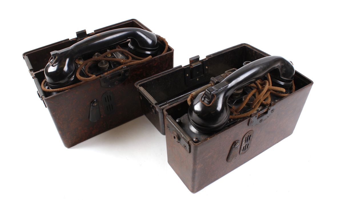 Two WWII German field telephones, in original bakelite cases with German phonetic alphabet labels, - Image 2 of 3