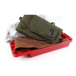 Case Gard bench rest, two canvas gun slips, two cartridges belts, Brady cartridge bag, pouches, etc