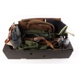 Box containing various cartridge bags, gun slips, gaiters, etc