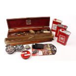 Cased 12 bore cleaning kit, boxed small bore cleaning kit, various empty pellet powder and cap tins,