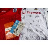 Tottenham Hotspur, a replica England shirt (large red) signed by Sol Campbell together with a
