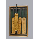 Cricket, four miniature bats, three mounted in display case with printed autographs, Australia