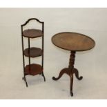 A George III mahogany tripod table, together with an Edwardian three tier octagonal cake stand (2)