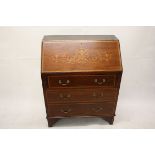 An Edwardian mahogany satin and boxwood inlaid fall front bureau, with inlaid vase and scrolls