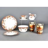 An Art Deco 'New Japan' tea set, decorated with roses, with swag design to rim, comprising cups,