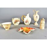 A collection of Royal Worcester blush ivory, including a ewer, jug, squat vase, a broken candles