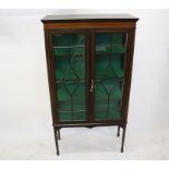 An Edwardian astragal glazed display cabinet, with boxwood stringing, tapering legs, spade feet,