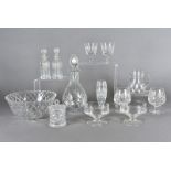 A quantity of cut glass, including a part suite, a silver topped vase, various fruit bowls etc (