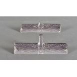 A pair of R Lalique dragonfly Libellule knife rests, stained amethyst, signed to side R Lalique
