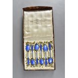 A set of six silver and enamel Scandinavian spoons, the blue guilloche enamel handles and spoon
