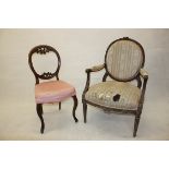 A 19th Century continental upholstered armchair, with oval back, stuffover seat together with a