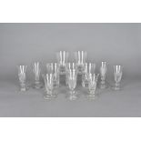A set of 19th Century water glasses, of tapered design with cut bases, 14 cm high (5) together