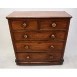 A 19th Century mahogany veneered chest of drawers, two short over three long drawers, turned handles