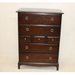 A modern chest of drawers, Stag style, four long and three short drawers, 82 cm wide x 102 cm high x