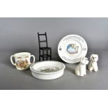 Two Wedgwood Peter Rabbit baby plates, together with a Bunnykins twin handled mug, a pair of