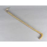 A Victorian horn riding crop, carved as a hawthorn branch with L shaped handle, lacking ferrule,