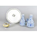 A 19th Century continental Delft table top oil and vinegar decanter set, together with a Delft plate