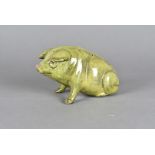 A Ewenny pottery pig, seated, titled Ye Pig dated to base 1900 in green glaze, 17 cm long x 10 cm