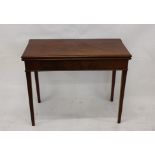 A 19th Century mahogany folding card table, with brass hinges, baize playing surface, on tapering