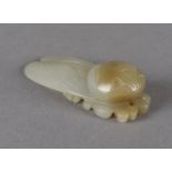 A 19th Century Chinese mutton fat jade carved cicada, the abdomen with bulbous head and pierced hole