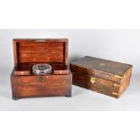 A George III mahogany tea caddy, with cut glass mixing bowl and two tea canisters with brass