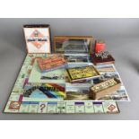 A collection of mid 20th Century board games and toys, including a set of prisoner of war