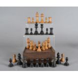 An early 20th Century boxwood chess set, in the Staunton style, king 9 cm
