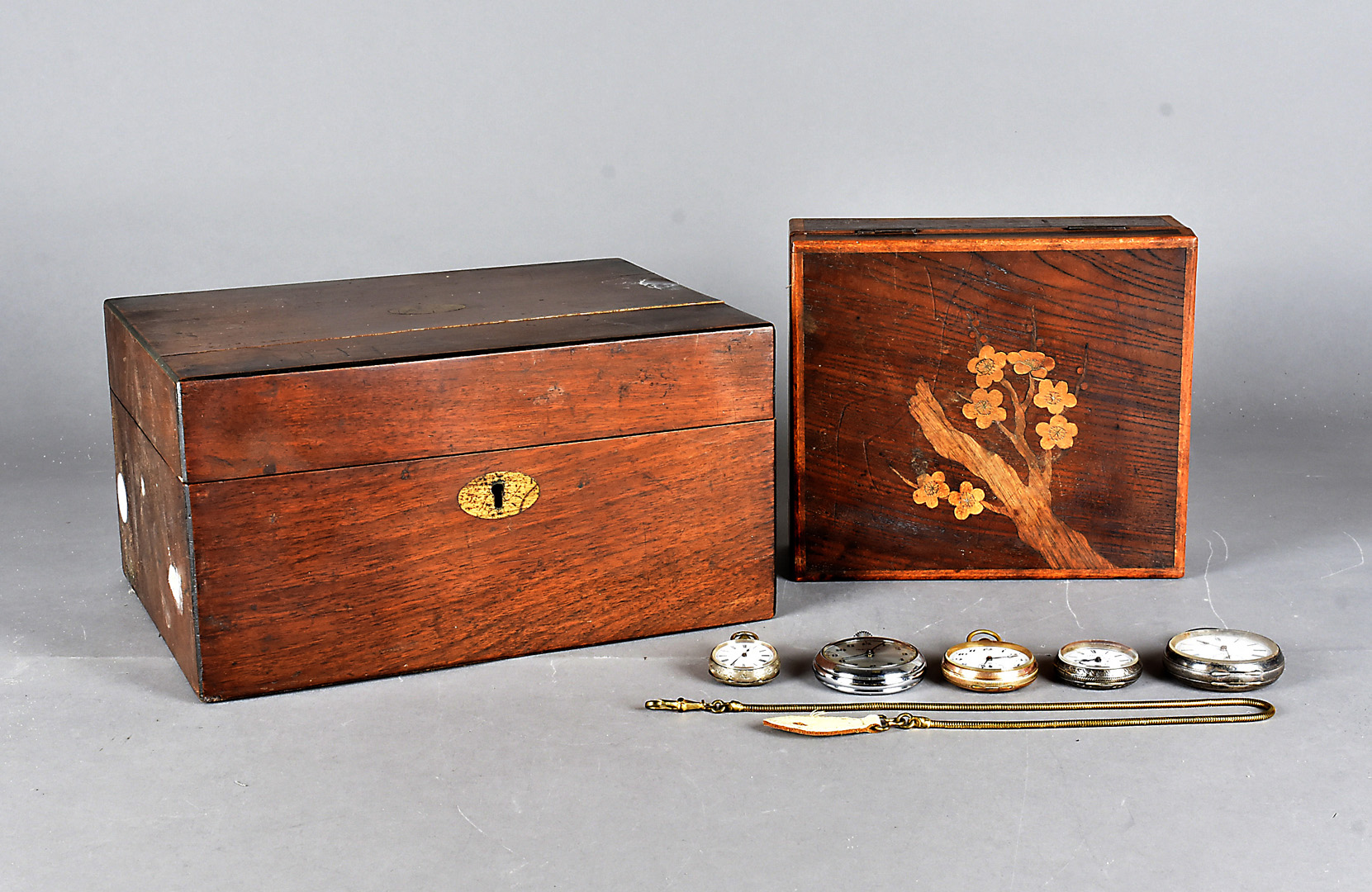 A small collection of open faced fob watches, including three silver examples, a gold filled example