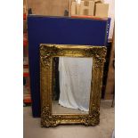 A gilt framed bevel glass wall mirror, 125 cm x 94 cm max