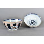 A pair of 18th Century Chinese porcelain bowls, with blue and white banding with open cartouches