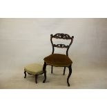 A 19th Century rosewood single chair, having carved back rest and splat, stuffover seat, together