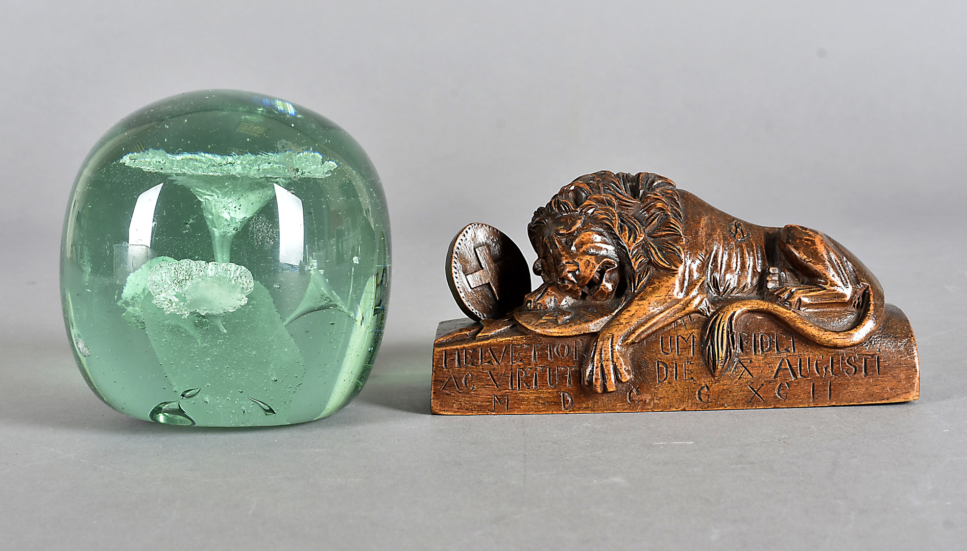 A late 19th Century Black Forest carved Lucerne lion, to commemorate the slaughter of the