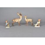 A Beswick Stag and matching Doe, together with two Hummel figures, Apple Tree Girl and Goose Girl (