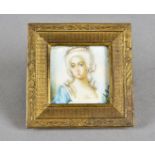 A Victorian. 19th Century portrait miniature, depicting a well dressed bust of a female in blue