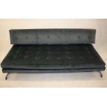 A Richard Young for Merrow Associates chromed sofa day bed, having blue button upholstery, loose