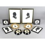 Four pairs of portrait silhouettes, including a pair of Mr and Mrs Harry Nolden, a pair of Edwardian
