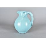 A Dutch Art Deco pottery blue jug, designed by Frans Van Katwijk, circa 1930, bulbous base with