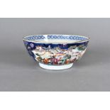An early 19th Century Chinese famille rose footed bowl, decorated with open cartouches with