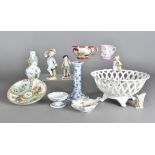 A quantity of continental ceramics, including figures, double gourd floral encrusted vases, cups and