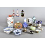 A collection of Chinese and Japanese items, including a large ovoid scent bottle with Chinese