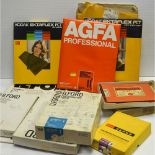 A Tray of Photographic Paper and Camera Accessories, various types and sizes of paper from