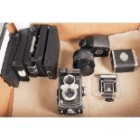 Medium Format accessories, including a Vivitar MC 2X Converter for Hasselblad 6x6, a Yashica-Mat LM