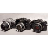 Nikon SLR Cameras, a F2 with Micro Nikkor 55mm f/3.5 lens, a Nikkormat EL with a Nikkor S 35mm f/2.8