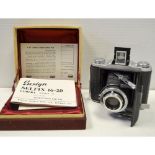 An Ensign Selfix 1620, with a Ross Xpres 75mm f/3.5 lens, in presentation box and various