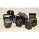 A Minolta Dynax 7xi Outfit, with 35-80mm f/4-5.6 zoom lens, 100-300mm f/4-5.6 Macro, 28-135mm f/4-