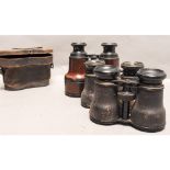 Opera Glasses, three pairs, one pair finished in brown leather, another signed with the number 8 and