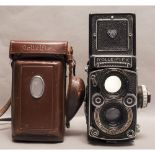 A Rolleiflex 35F TLR Camera, with Zeiss Planar 75mm f/3.5 lens in original maker's leather case