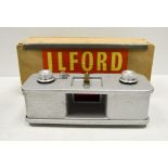 An Ilford Film Strip Printer, with half-frame mask, in maker's wooden box