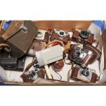 A Leitz Leicina 8s, 8mm cine camera in original branded leather case with instruction manual and