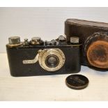 A Leica I Model A, no. 49618, Elmar 50mm f/3.5, baseplate hand painted, brassing to top plate and